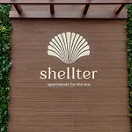 Апартаменты Shellter By The Sea